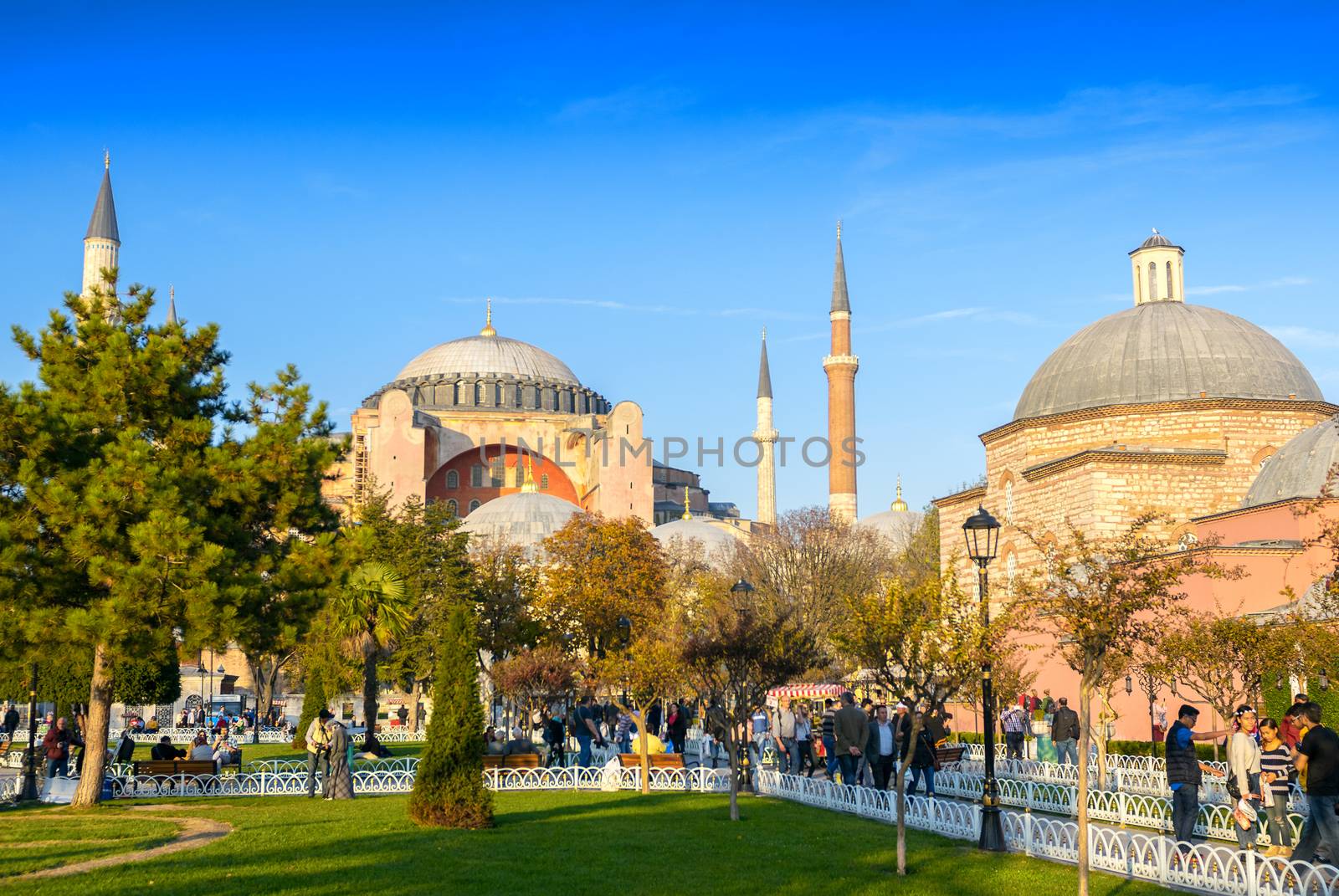 ISTANBUL, TURKEY - SEPTEMBER 14, 2014: Tourists walk in Sultanahmet Square. More than 10 million people visit the city every year.