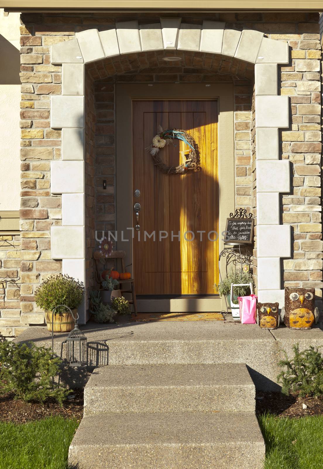Front door entrance of a home with decor.