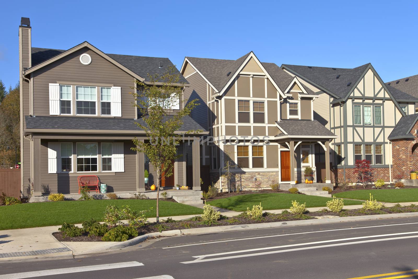 Row of new homes in Willsonville Oregon. by Rigucci