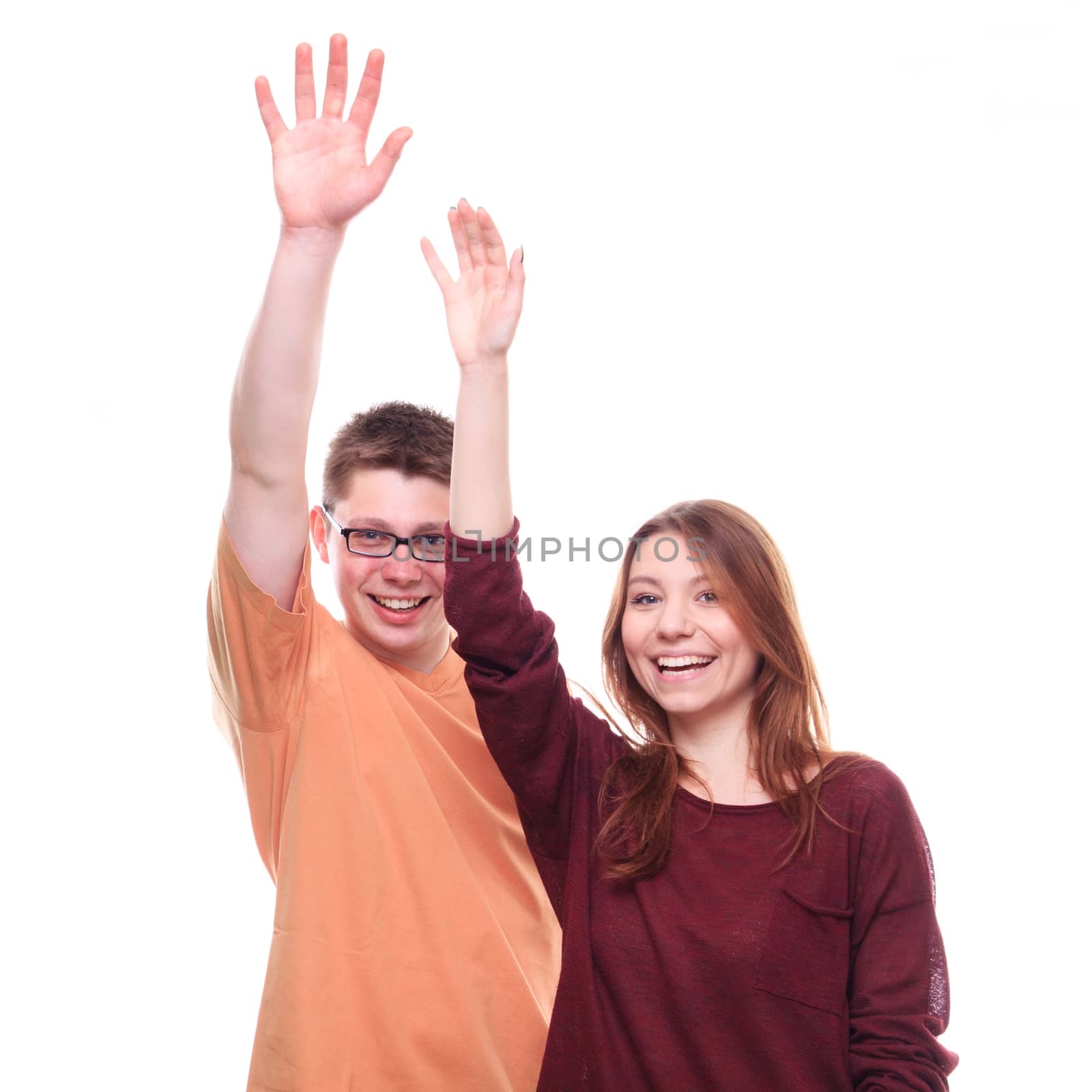 Boy and girl with hands up on white background  by MichalLudwiczak