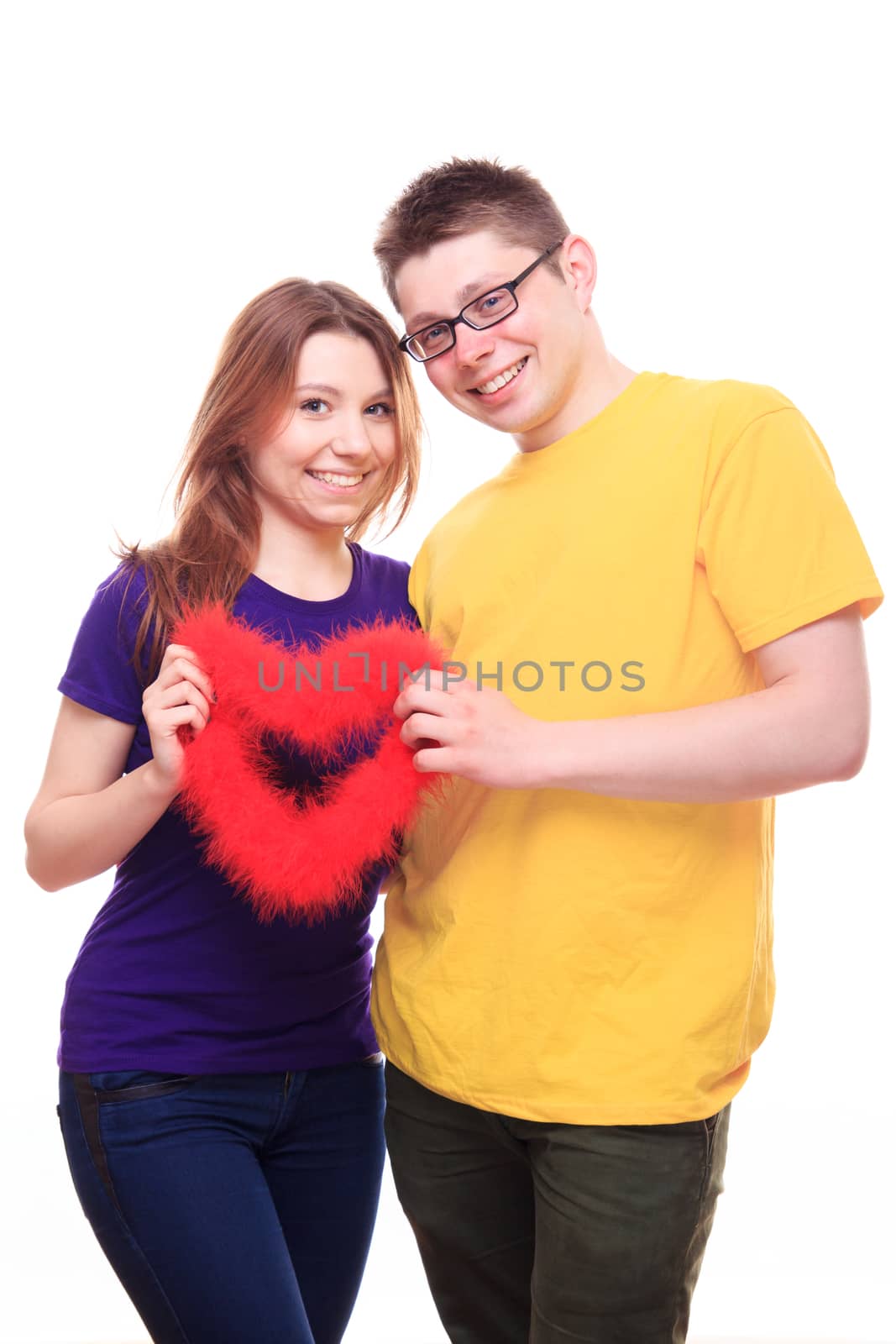 Smiling two people in love holding heart by MichalLudwiczak