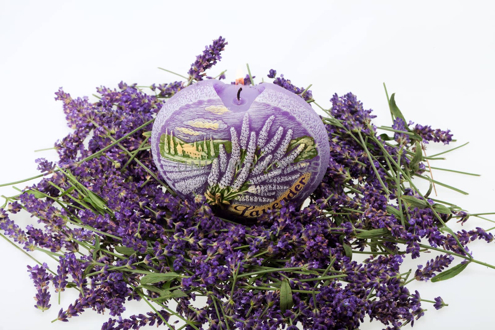  Lavender and candle  isolated on white background