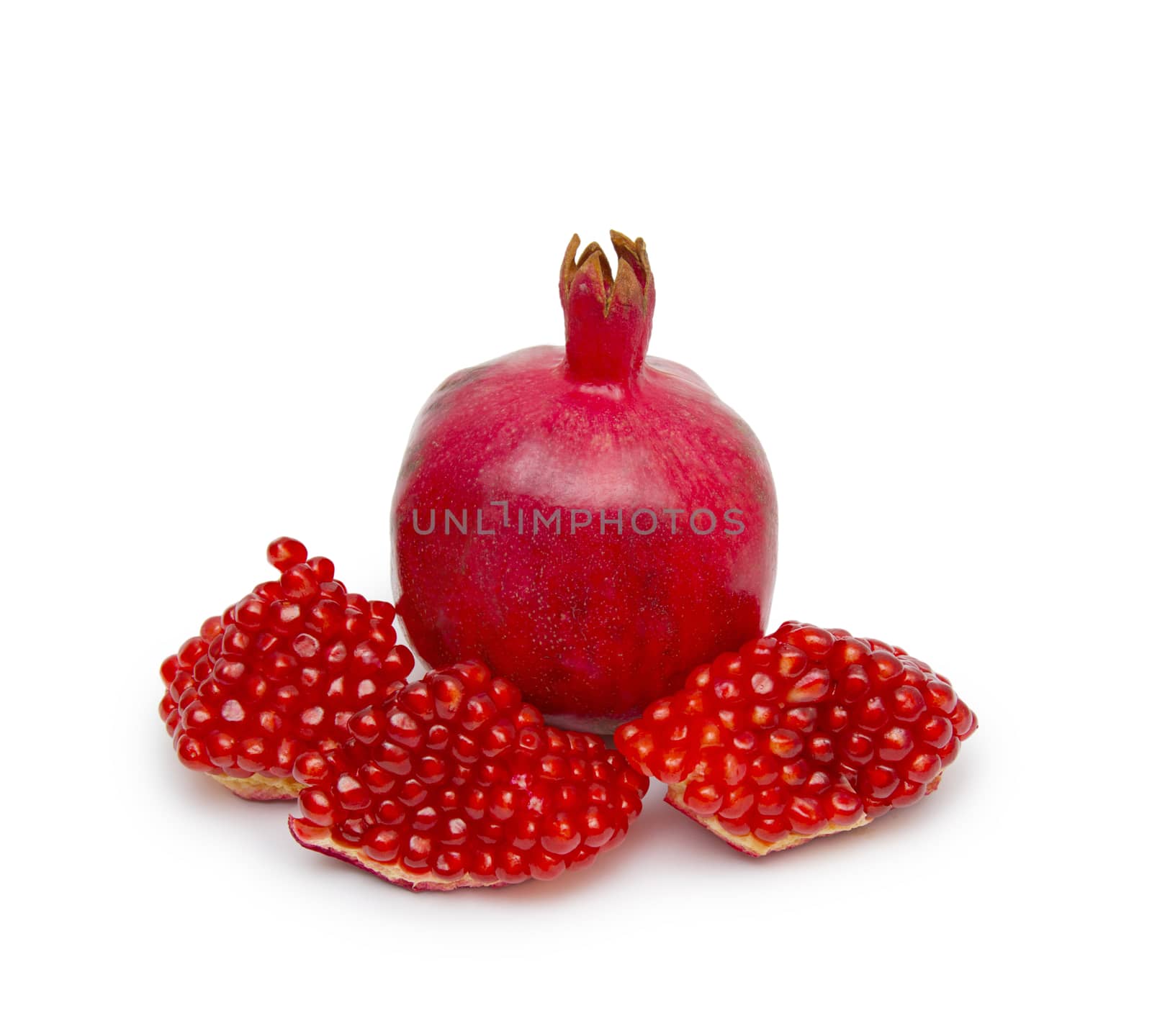 Ripe pomegranate fruit isolated on white background cutout by cocoo