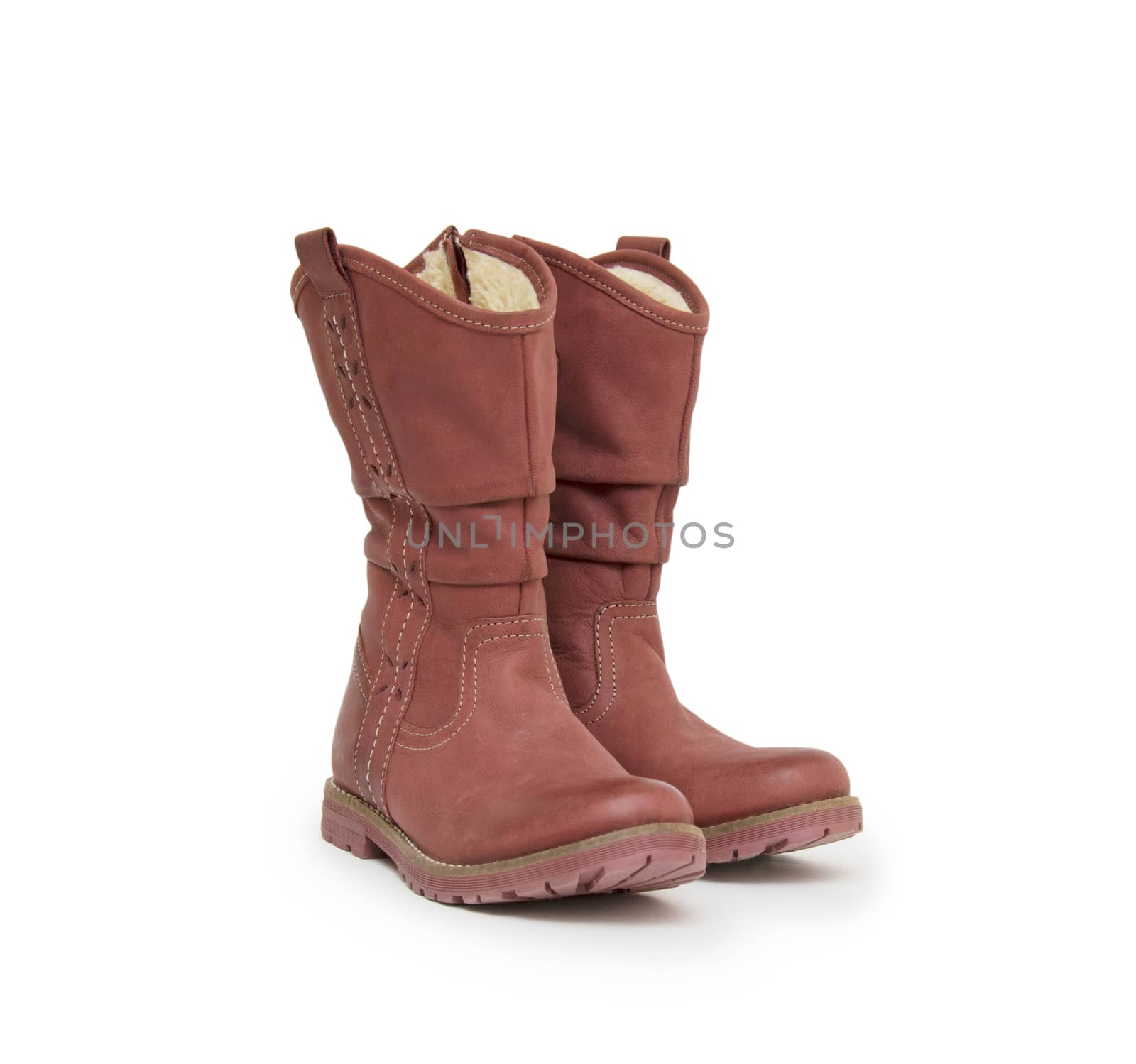 pair of boots isolated on a white background. by cocoo