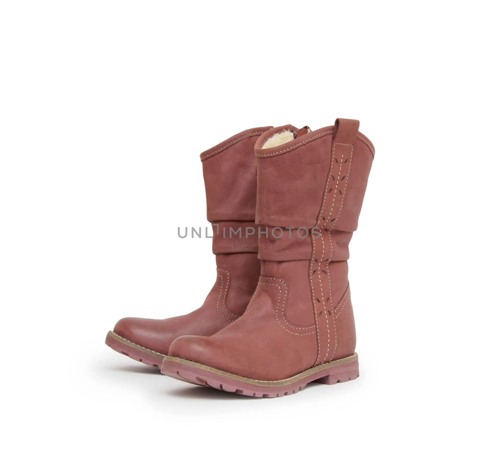 pair of boots isolated on a white background. by cocoo