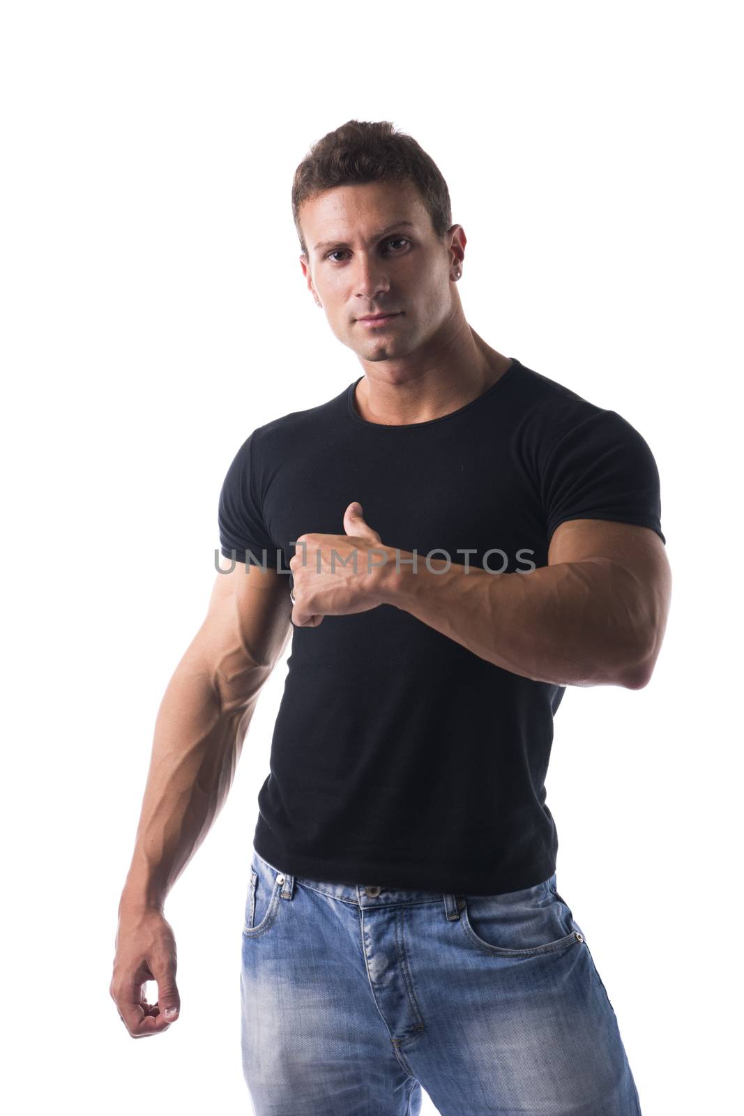 Handsome young man pointing thumb finger at himself, isolated on white