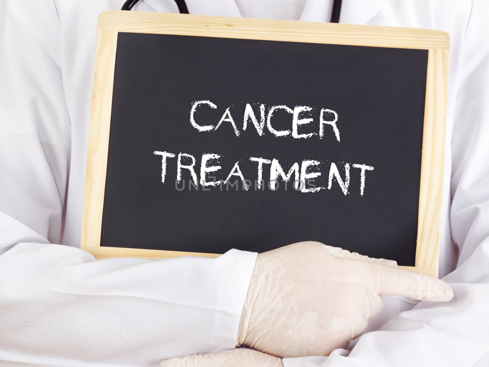 Doctor shows information: cancer treatment by gwolters