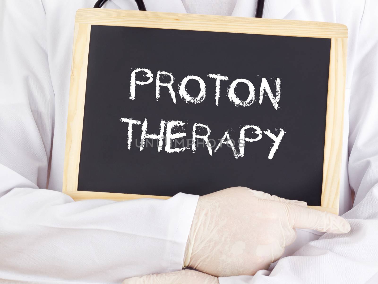 Doctor shows information: proton therapy