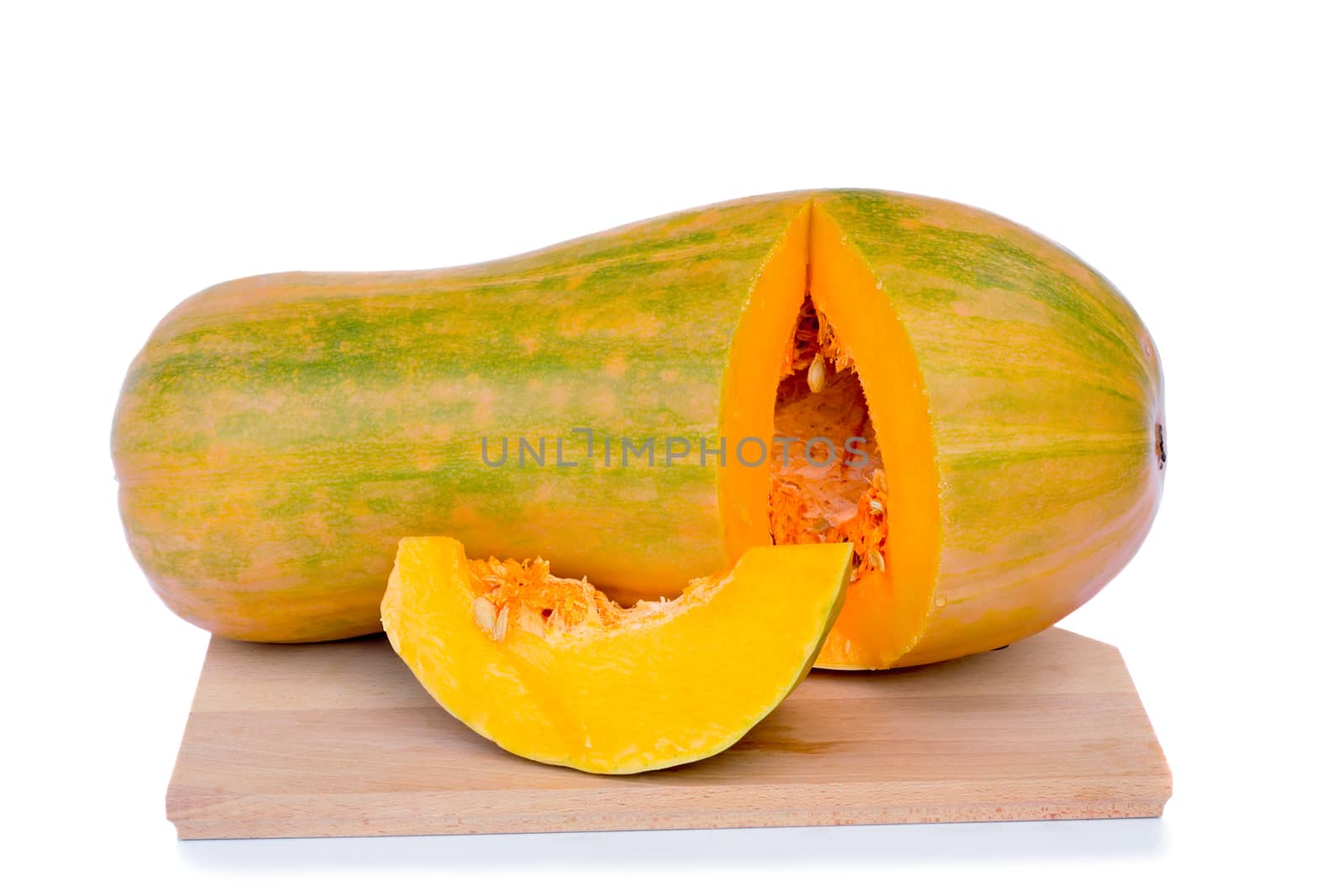 Ripe cut the pumpkin on a white background.  by georgina198