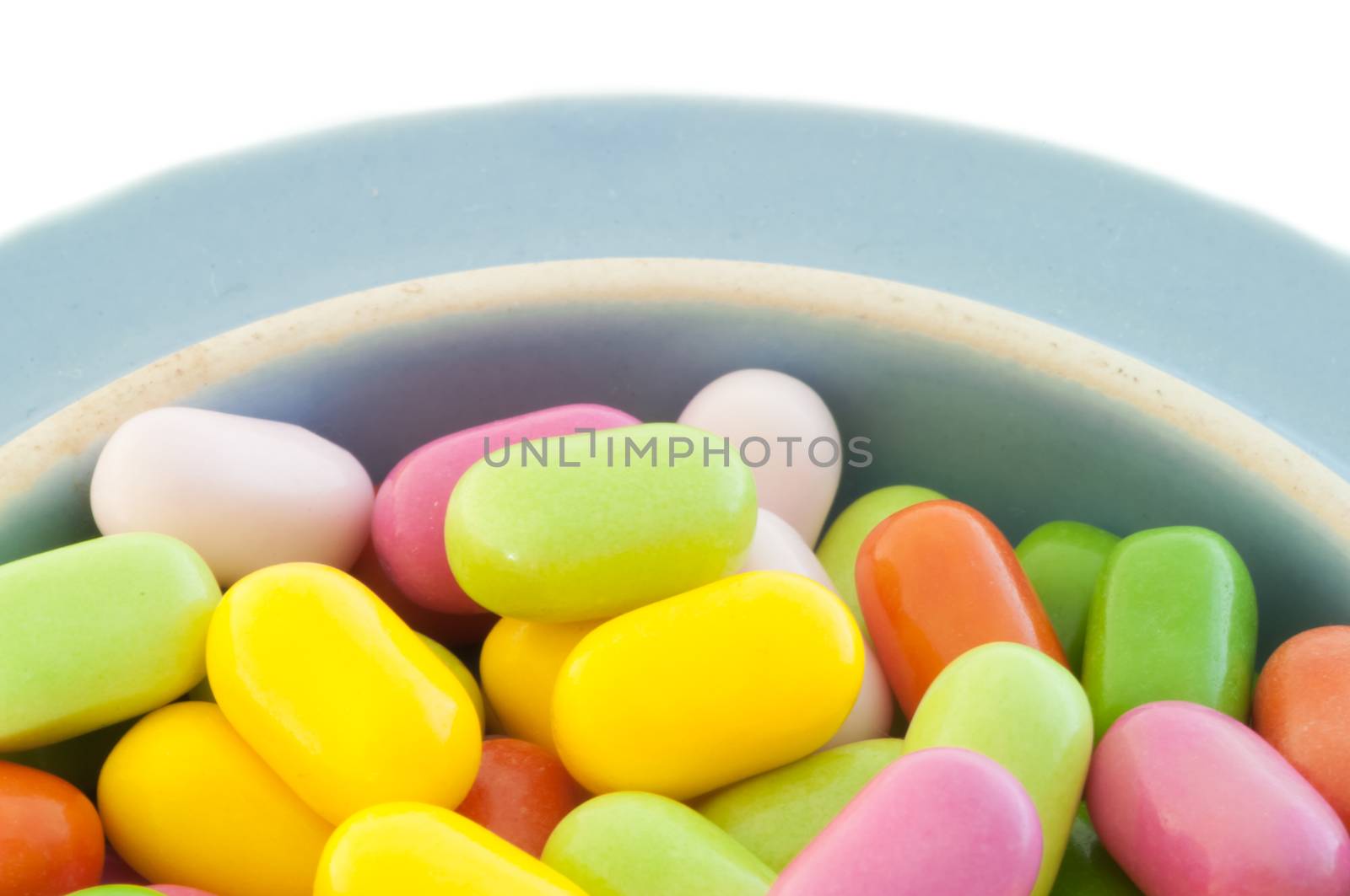 beautiful background of colored and various candy or pills