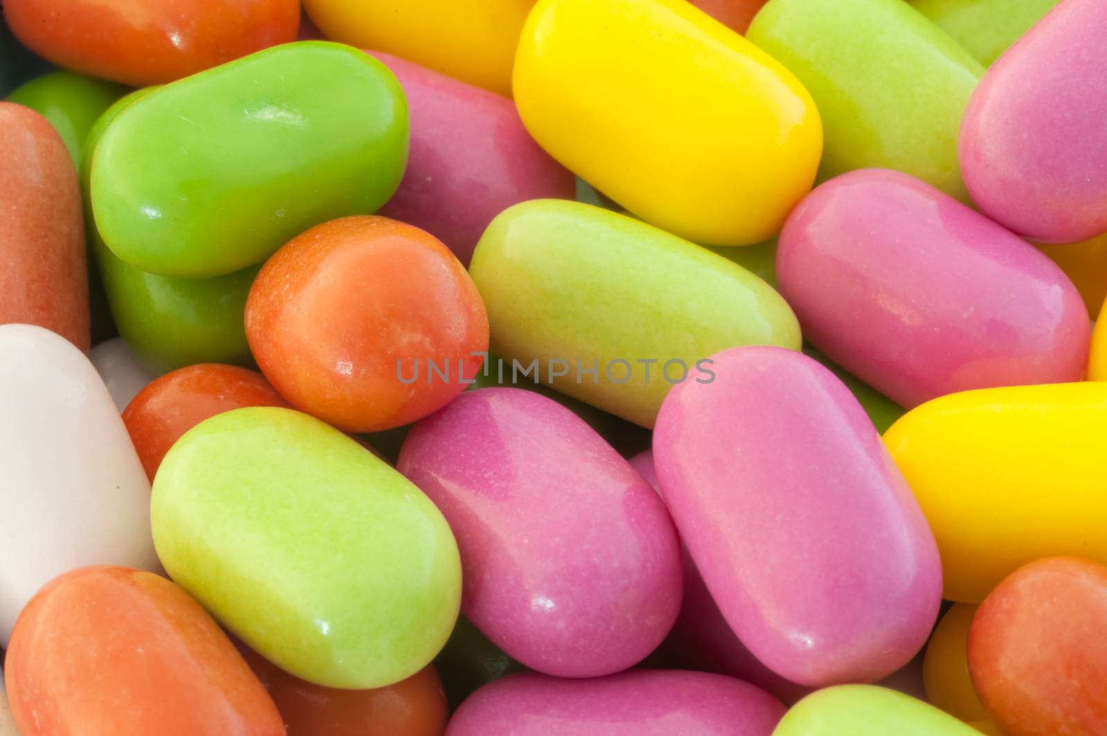 beautiful background of colored and various candy or pills