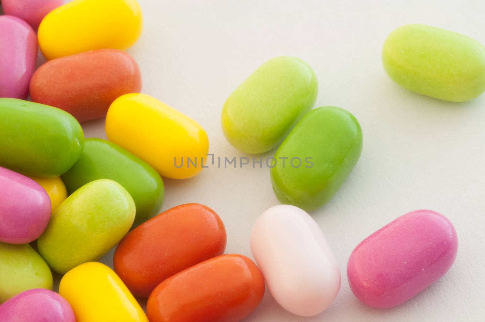 beautiful background of colored and various candy or pills