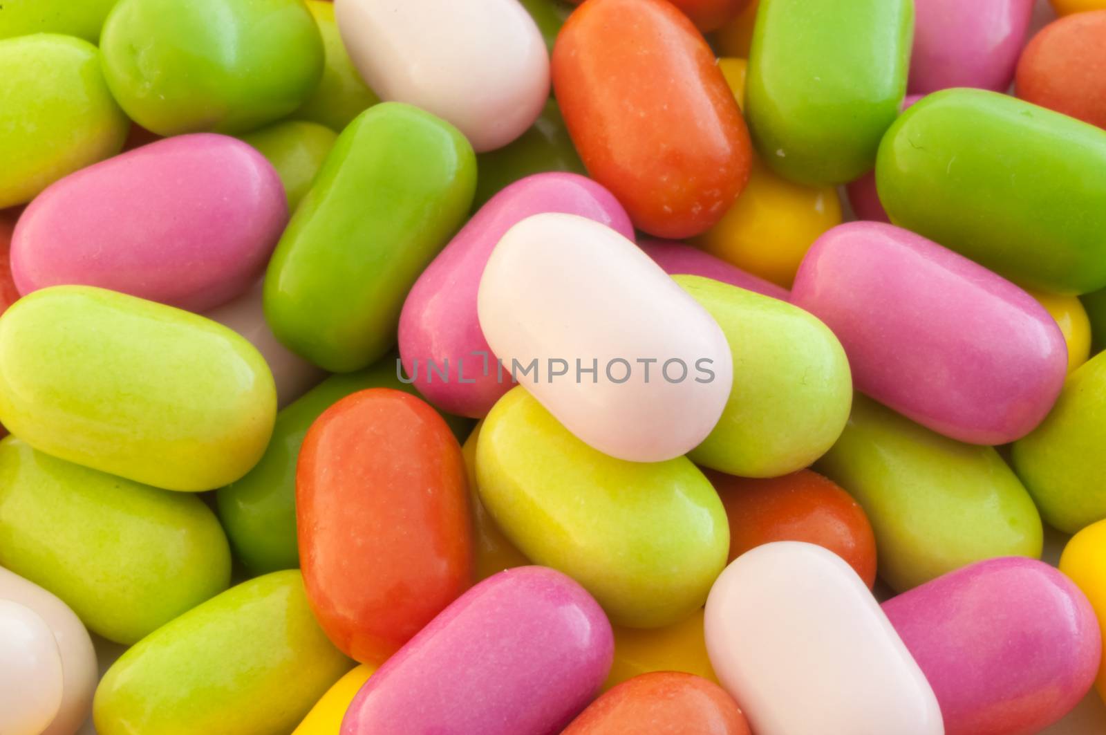 beautiful background of colored and various candy or pills