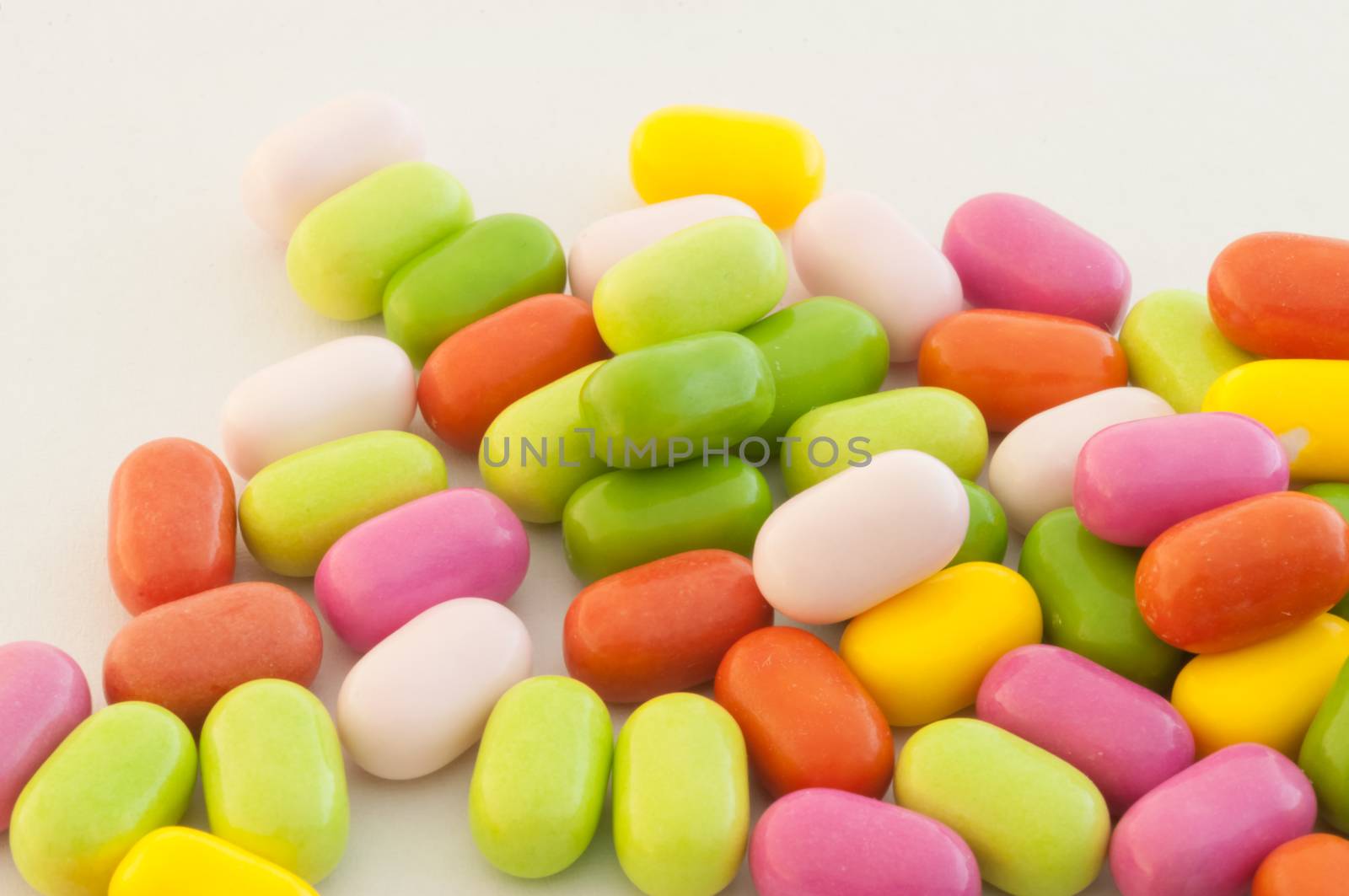 beautiful background of colored and various candy or pills