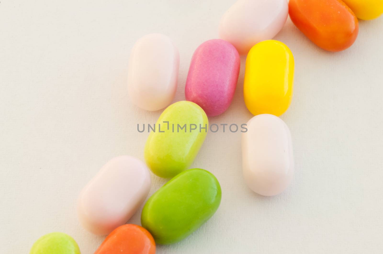 beautiful background of colored and various candy or pills