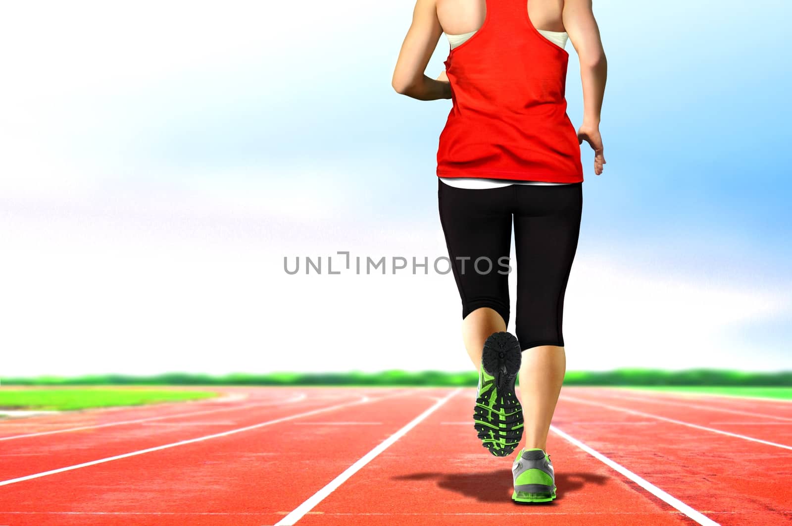 Women Jogging on Running Tracks