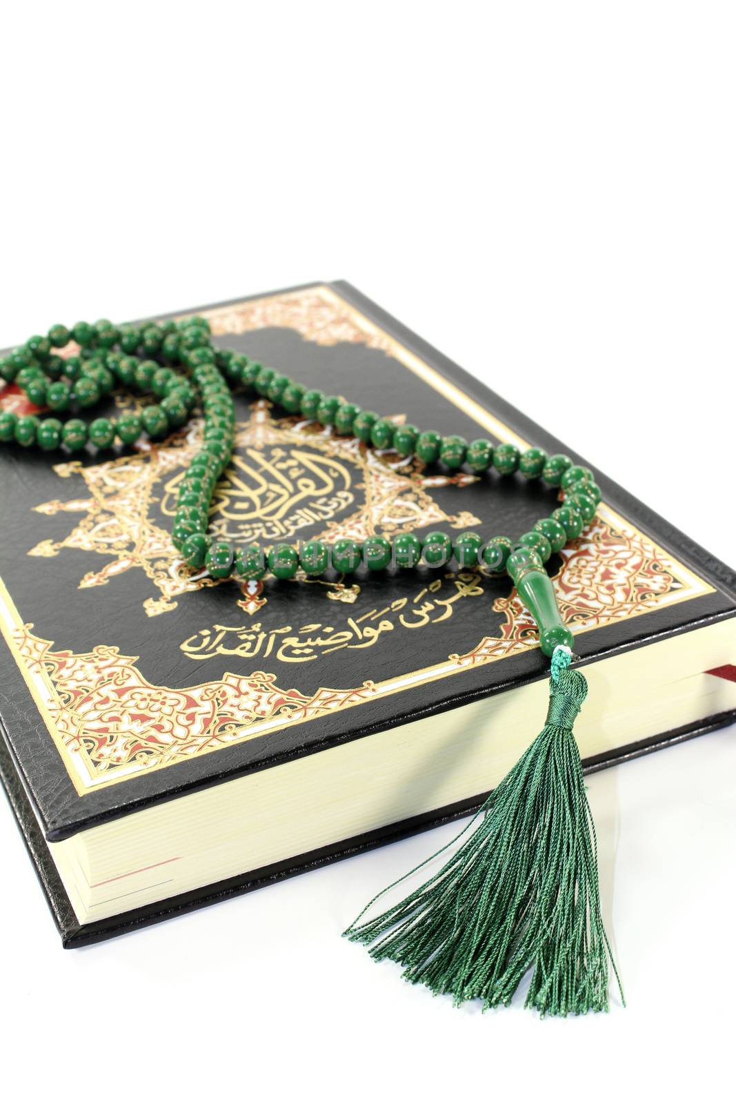 Quran with rosary by discovery