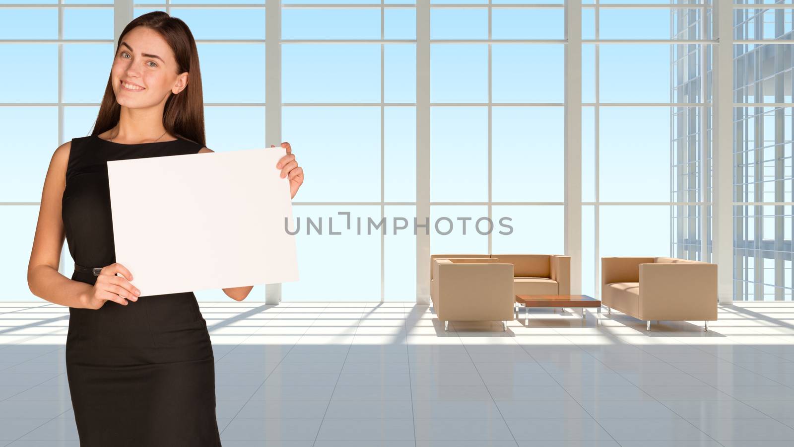 Businesswoman holding empty paper by cherezoff