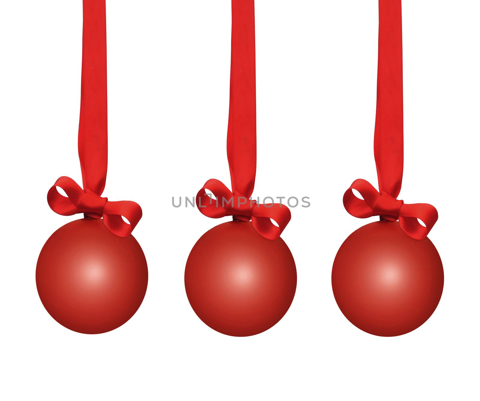 Red christmas baubles with ribbon bows over a white background