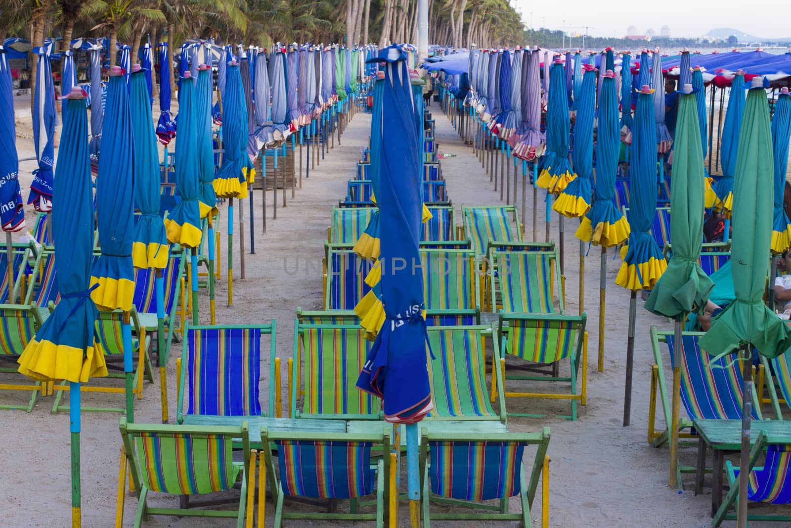 View of beach chair and umbrella on the beach