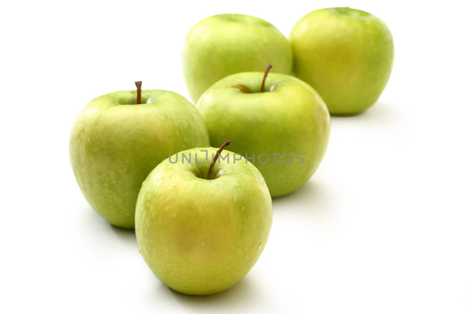 Green apples on white background 