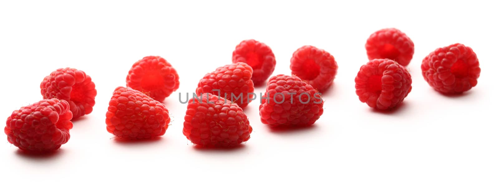 Fresh raspberry on white background