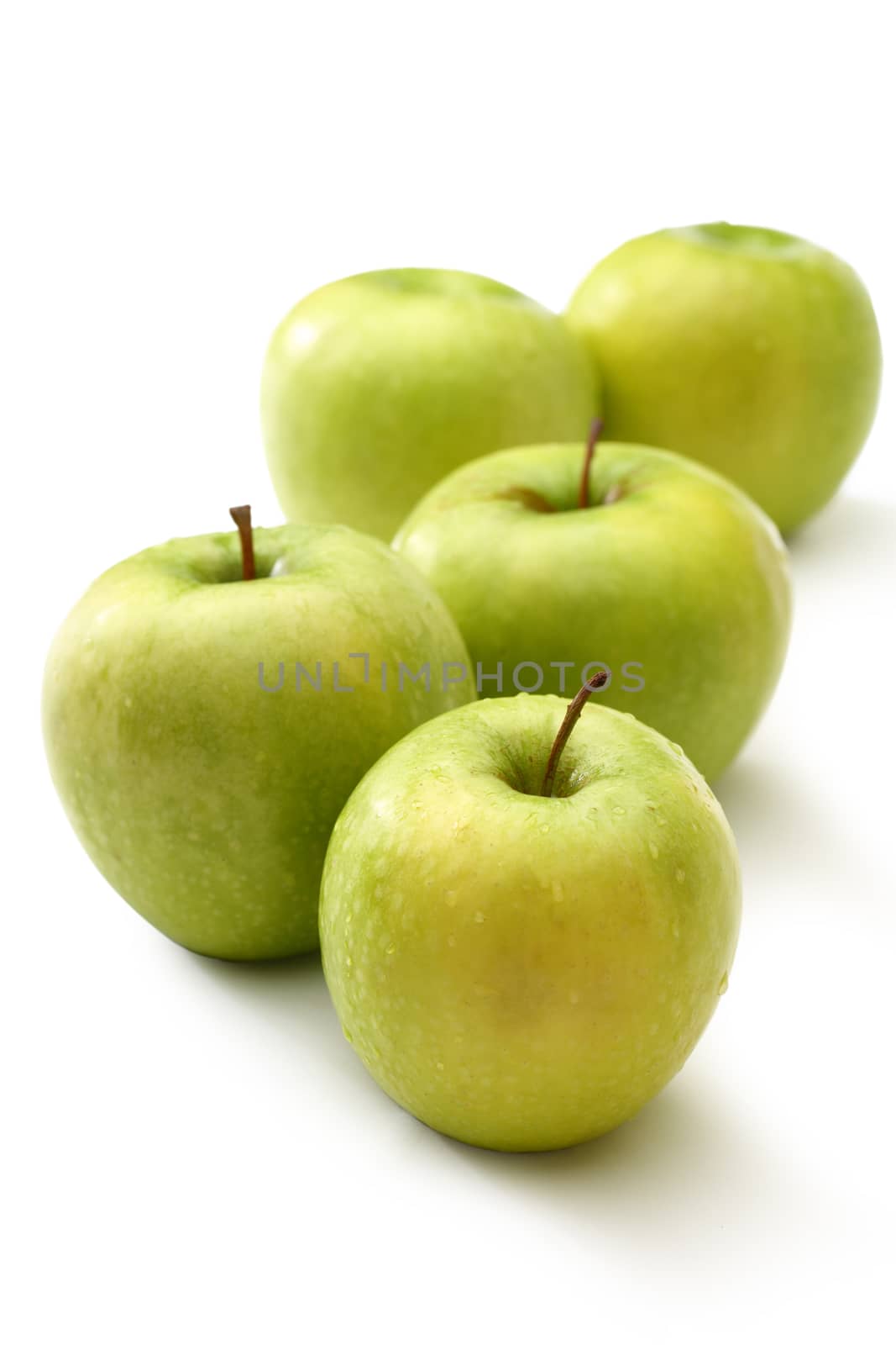 Green apples on white background 