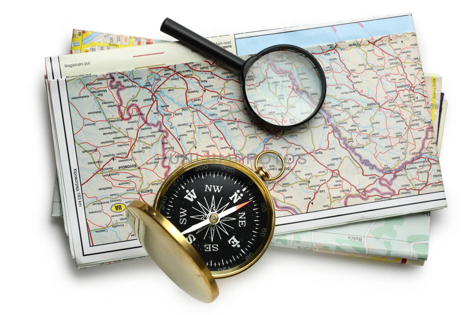 Road map plan and compass on white