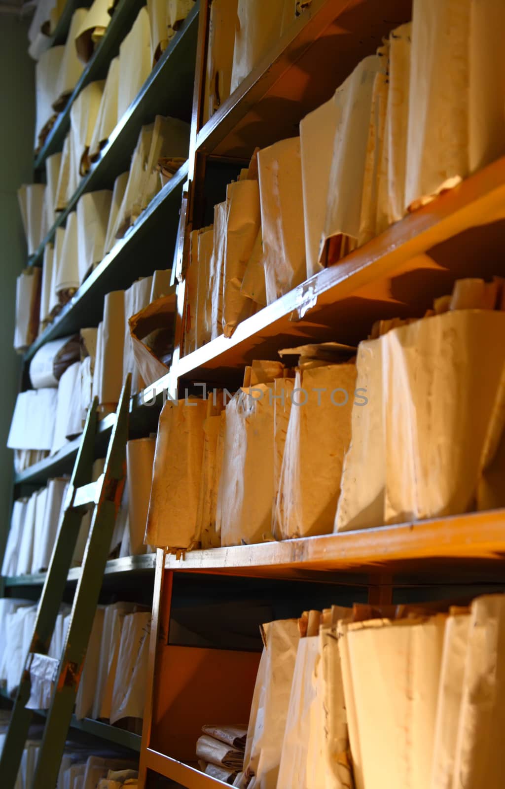 Shelves with paper document in archive