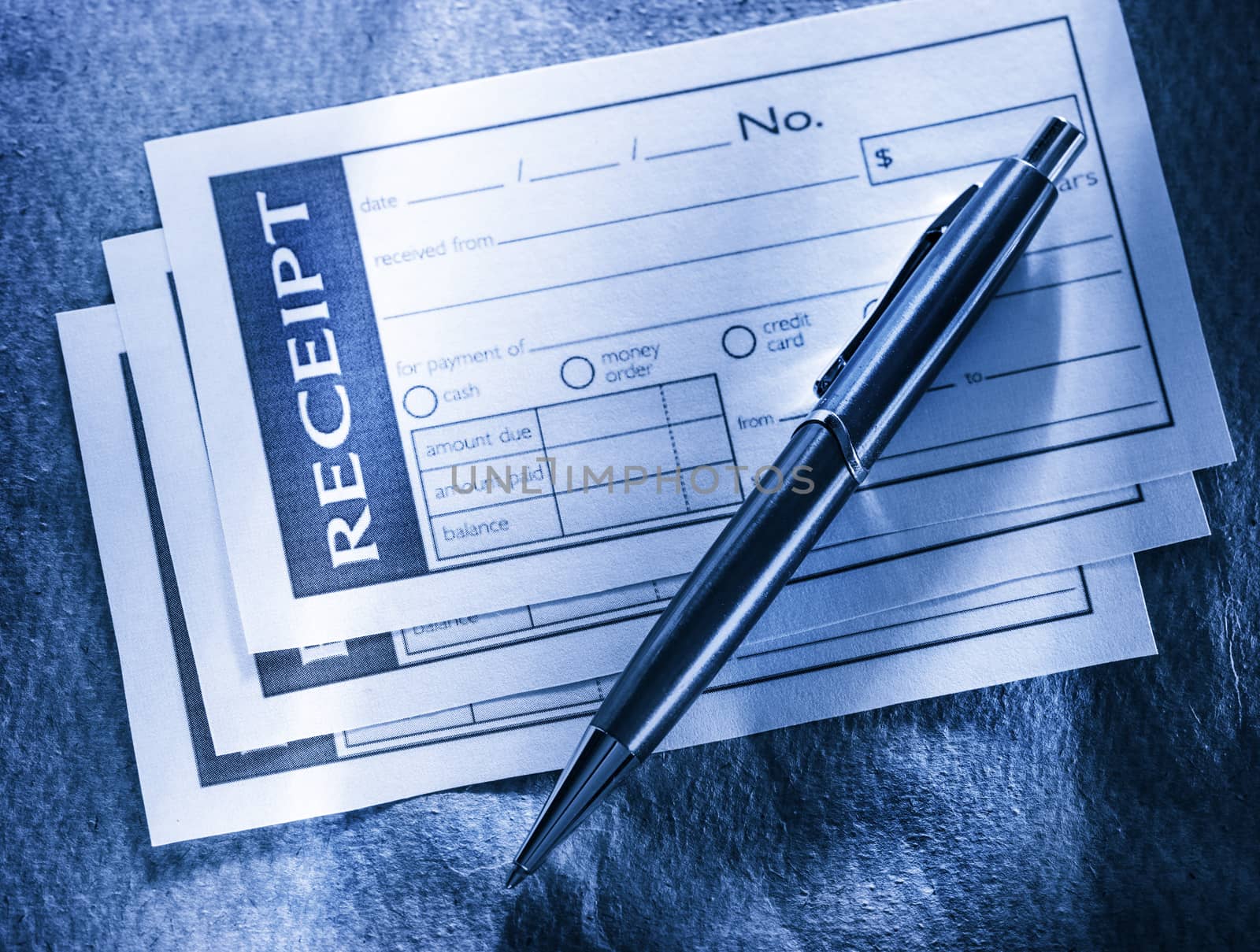 Blank receipt and pen