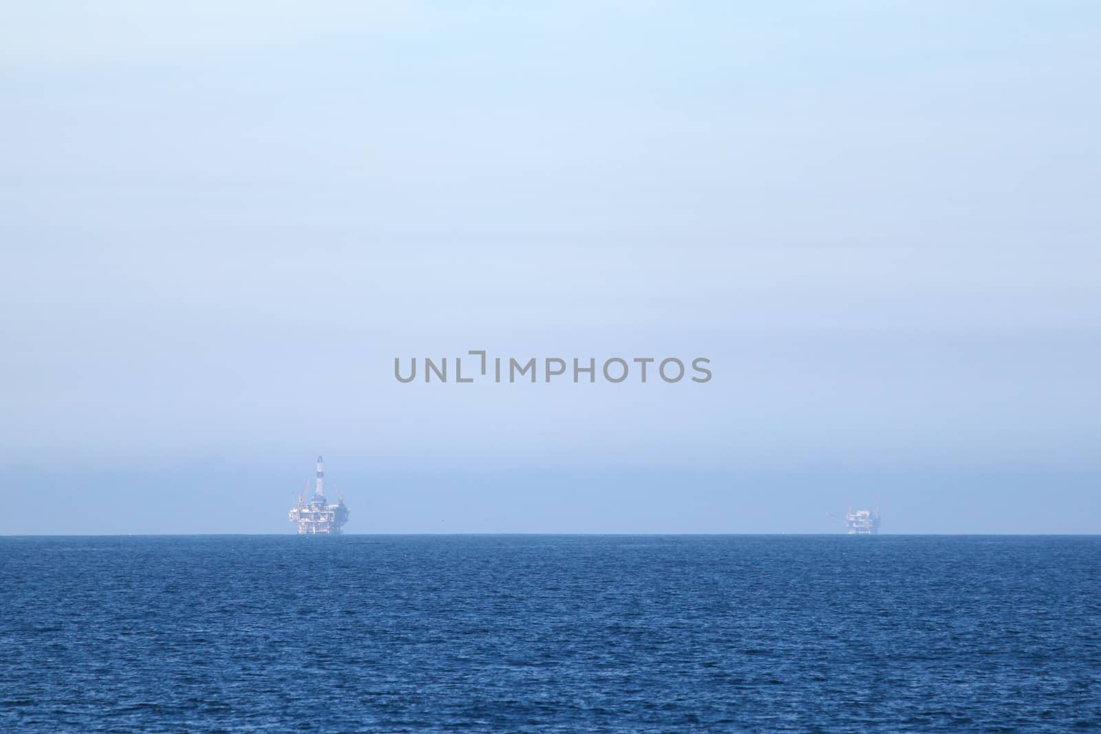 Two Oil Rigs by hlehnerer