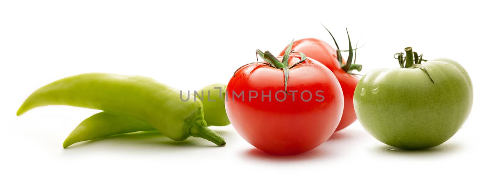 Red and green tomatoes with paprika