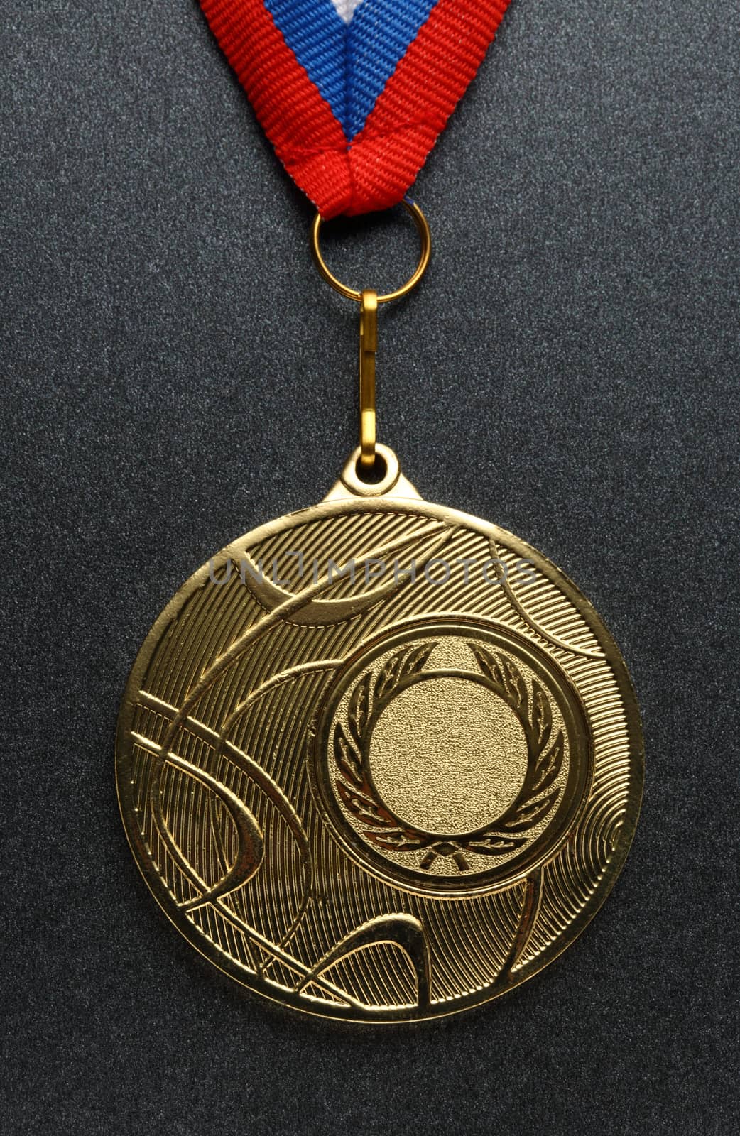 Metal medal with tricolor ribbon