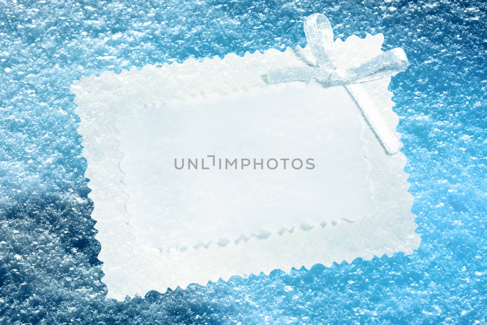 Greeting card on the blue snow background