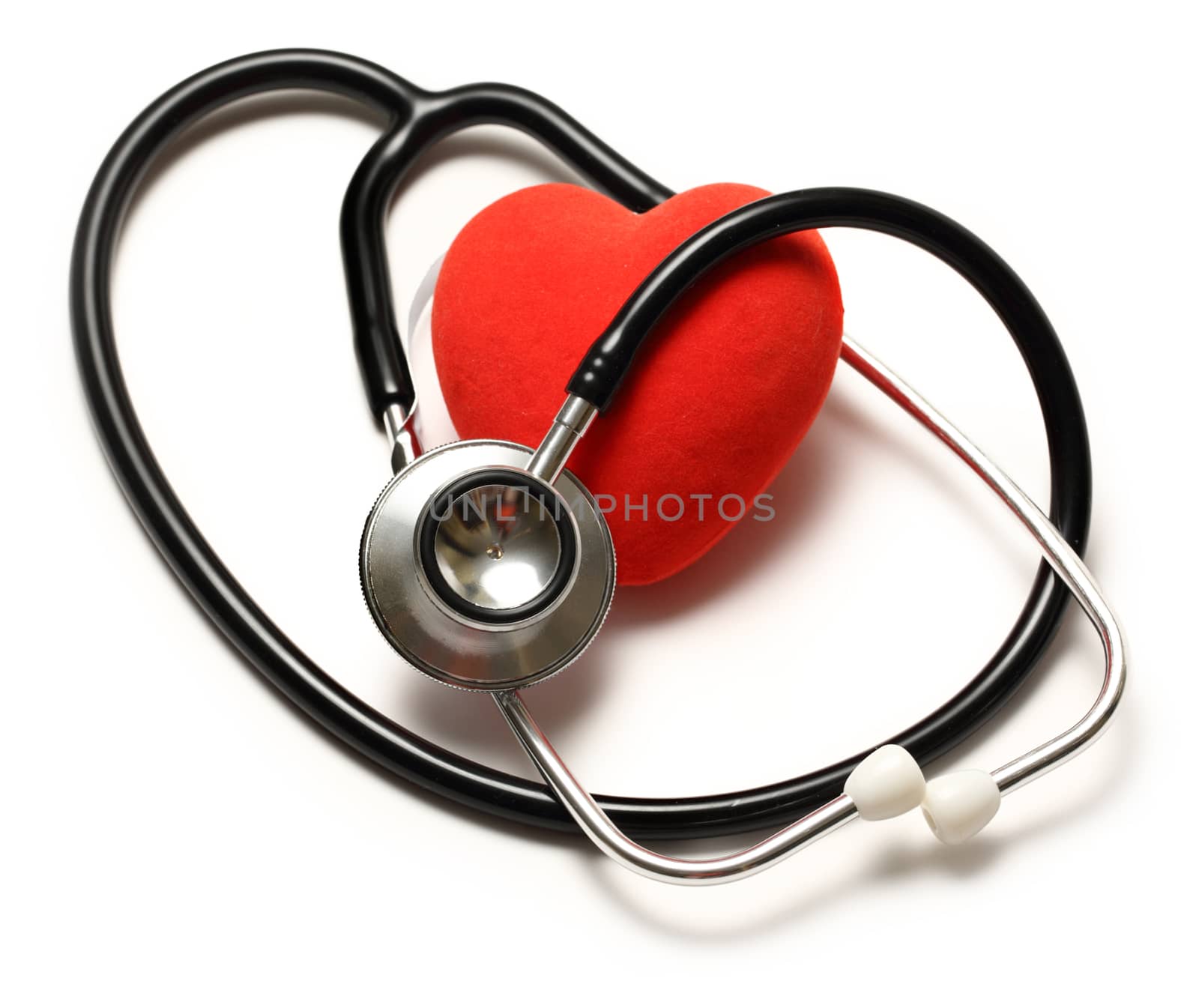 Stethoscope and red heart on white