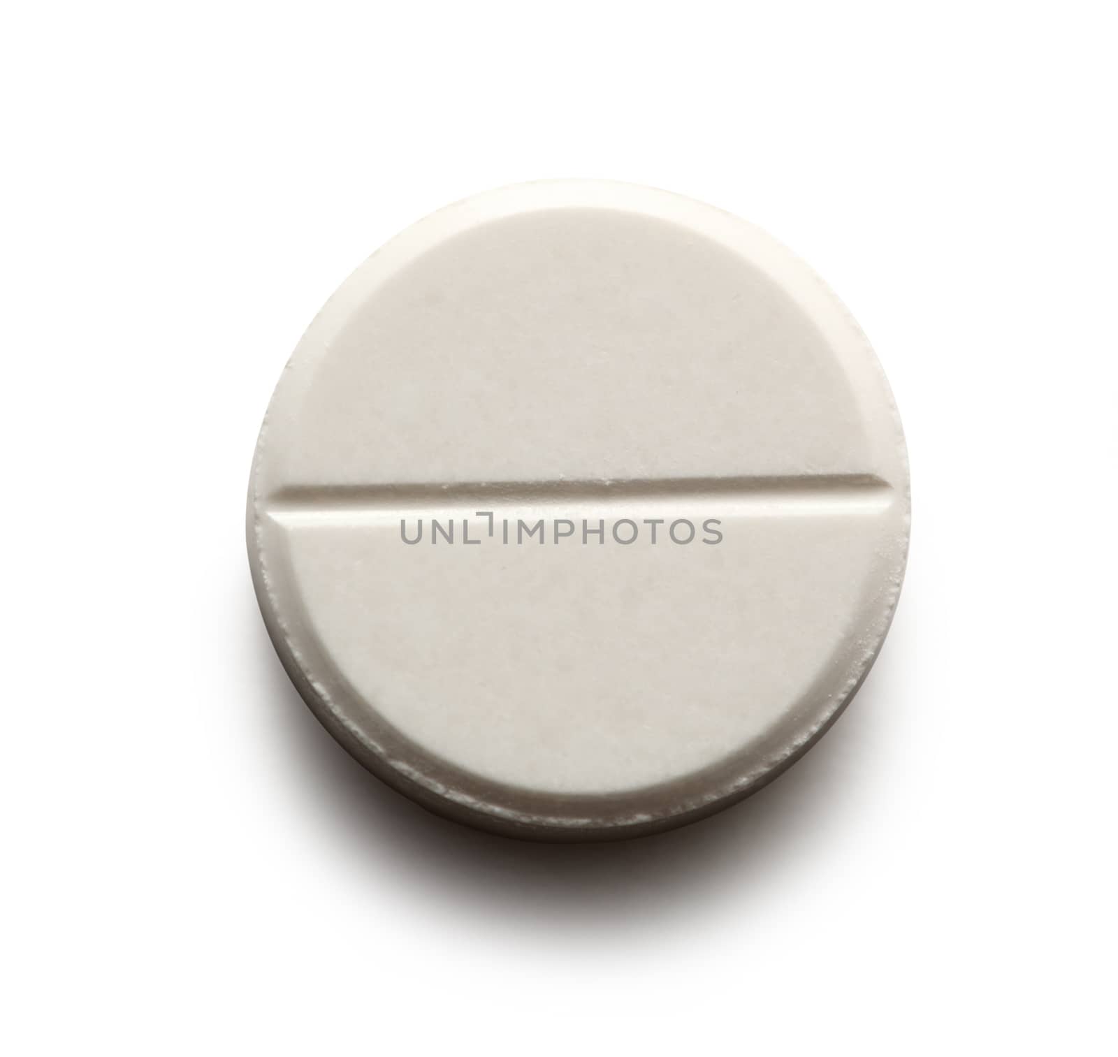 Aspirin pill on white background