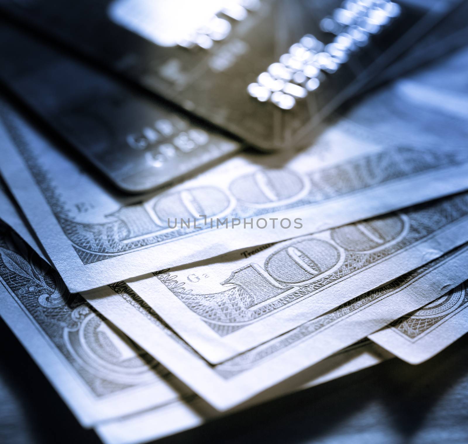 Credit cards and dollars in cash