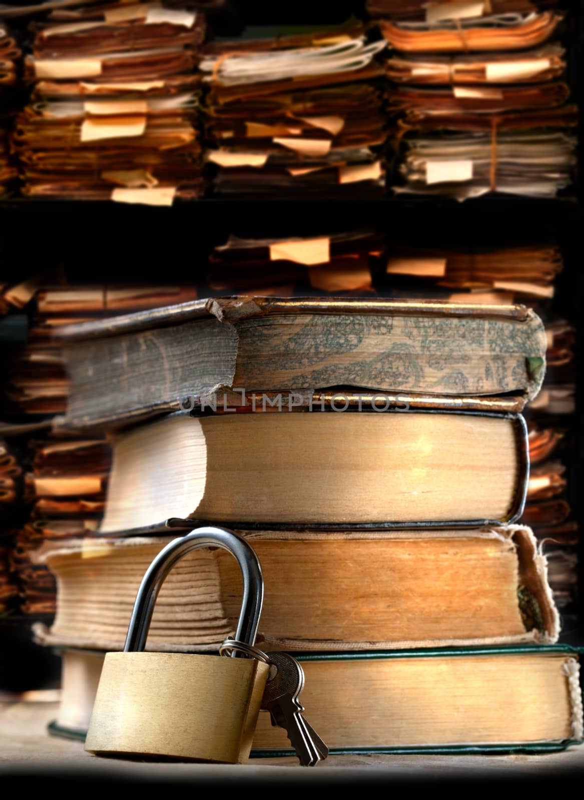 Pile of old books and keylock by Garsya