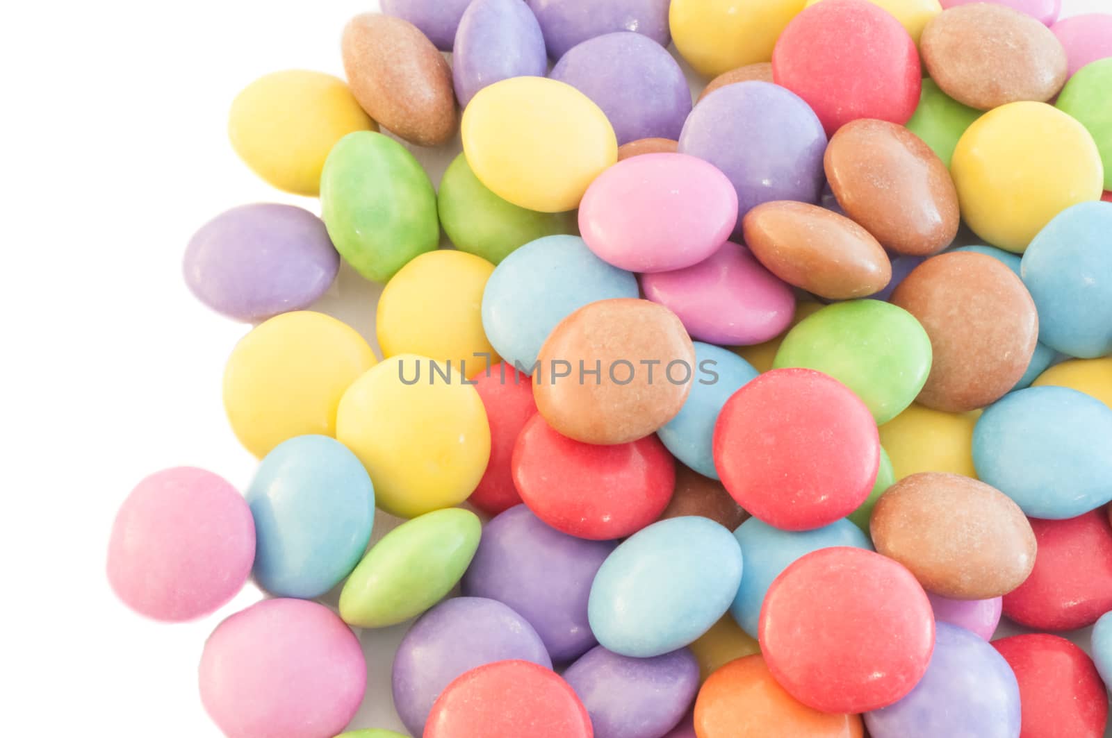 beautiful background of circular colored and various candy or pills