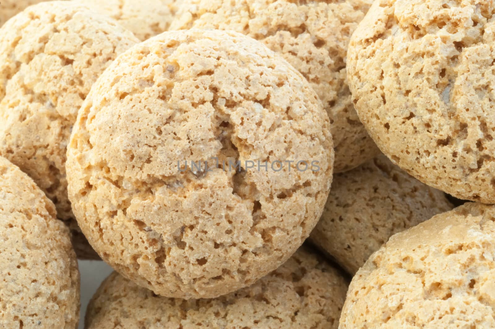 macro details of macaroons cookies in white background