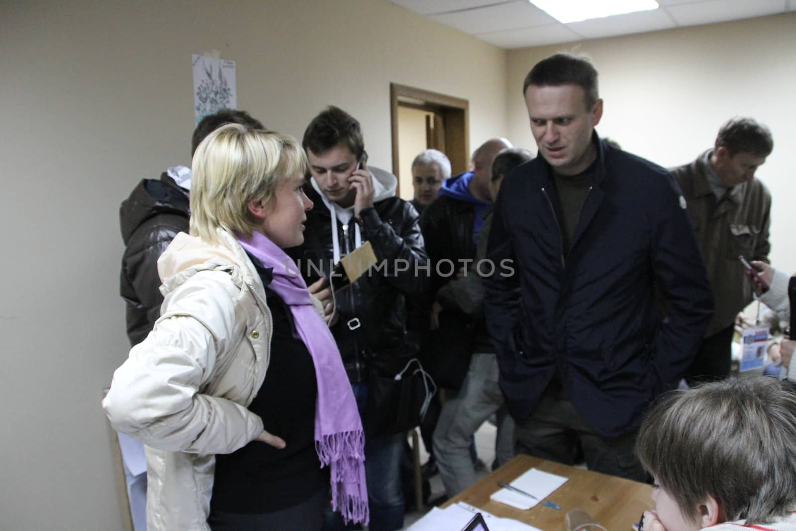 Khimki, Moscow region, Russia - October 14, 2012. Candidate for mayor of Khimki opposition Evgeniya Chirikova communicates with the politician Alexei Navalny, who came in her campaign headquarters. On election day in the suburban town of Khimki broke sharp competition between the candidate of the Kremlin Oleg Shahov and representative opposition Yevgenia Chirikova