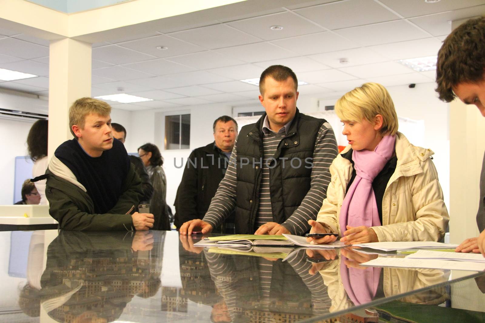 Khimki, Moscow region, Russia - October 14, 2012. Candidate for mayor of Khimki opposition Evgeniya Chirikova writes a complaint about violations at one of the polling stations. On election day in the suburban town of Khimki broke sharp competition between the candidate of the Kremlin Oleg Shahov and representative opposition Yevgenia Chirikova