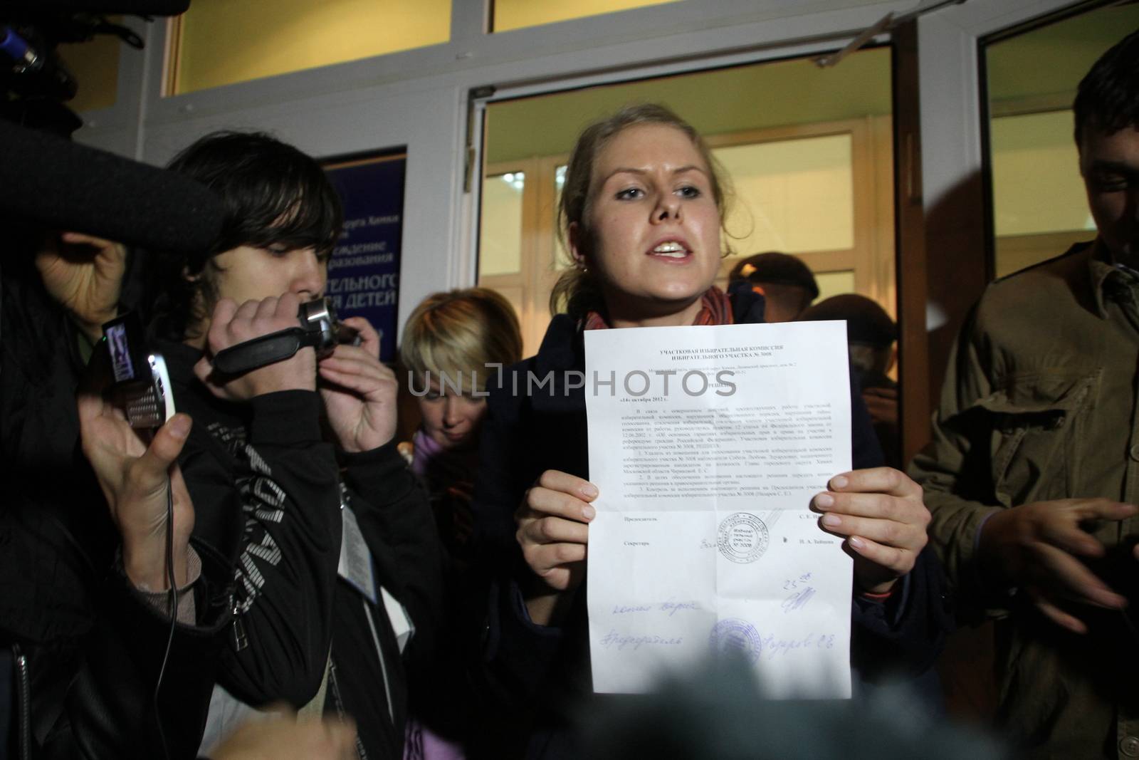 Khimki, Moscow region, Russia - October 14, 2012. Election observers Lubov Sobol tells the press about violations at its polling. On election day in the suburban town of Khimki broke sharp competition between the candidate of the Kremlin Oleg Shahov and representative opposition Yevgenia Chirikova