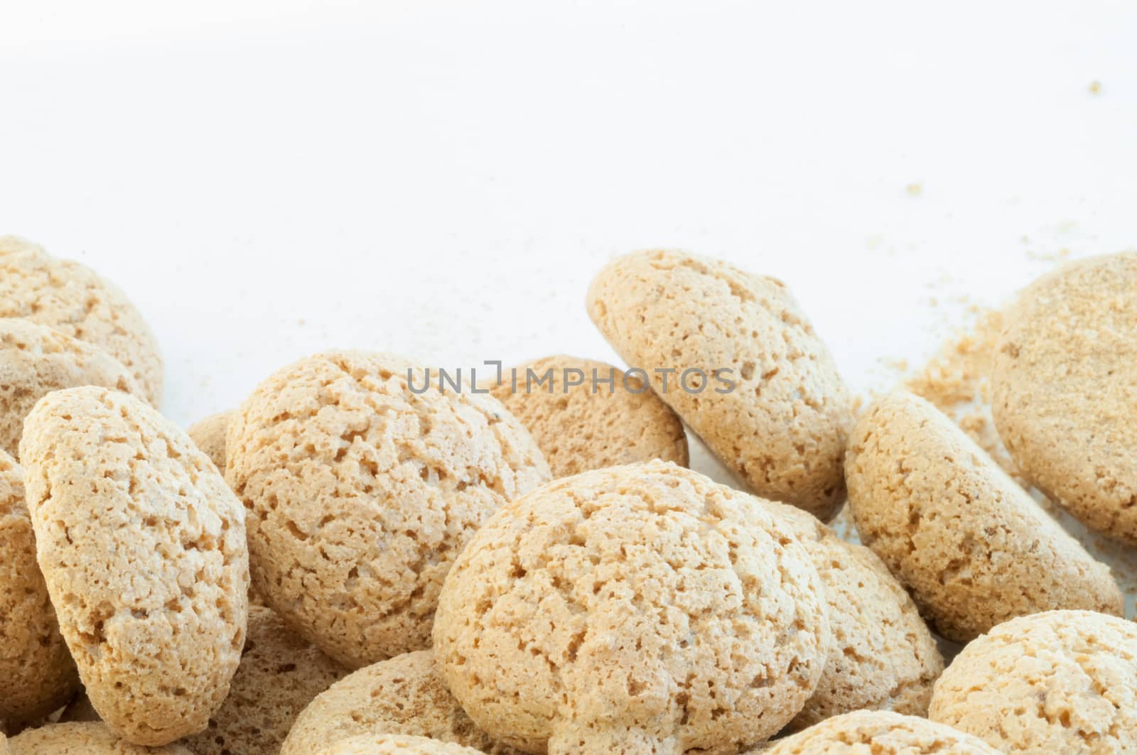 macro details of macaroons cookies in white background