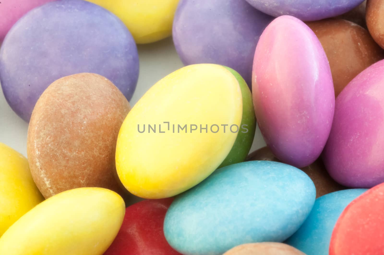 beautiful background of circular colored and various candy or pills