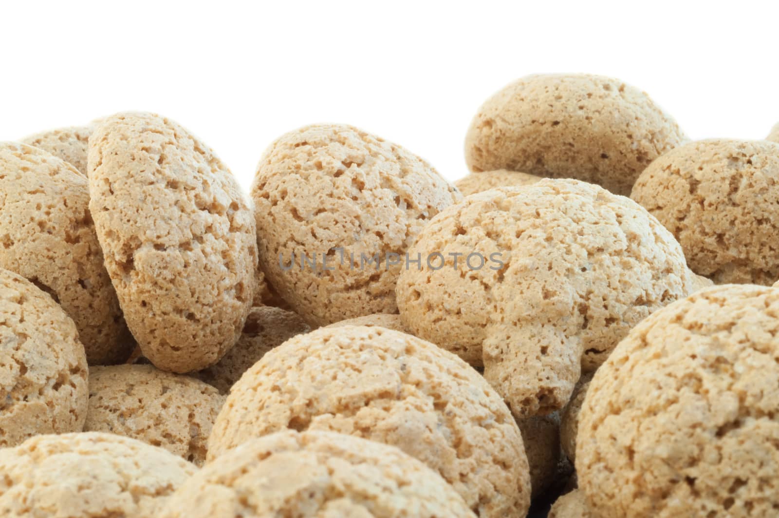 macro details of macaroons cookies in white background