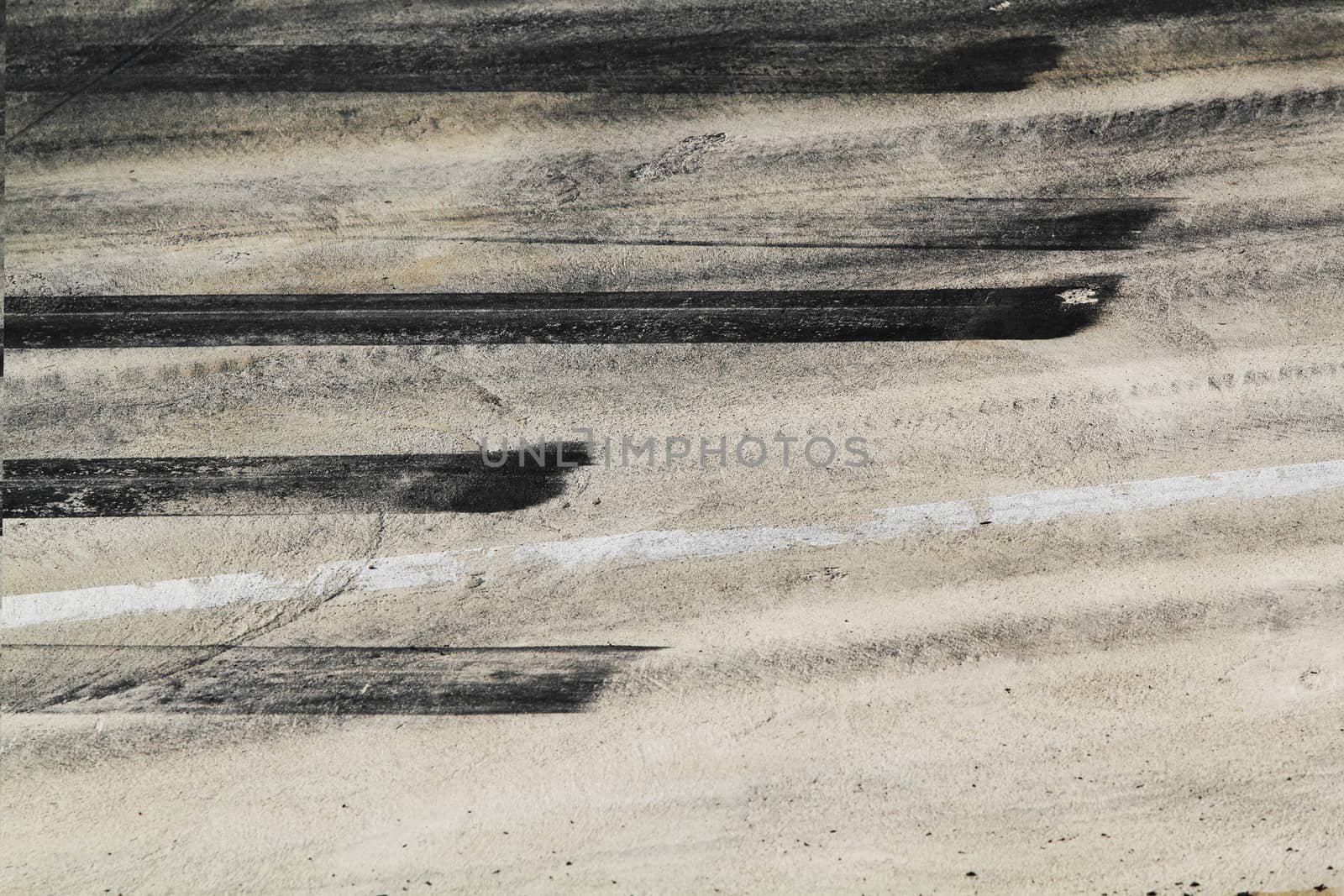 Background with tire marks on road track