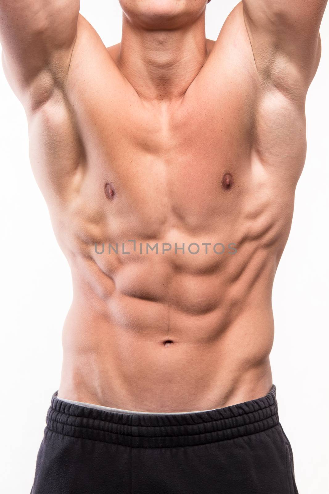 Muscular man body with six pack - studio shoot 