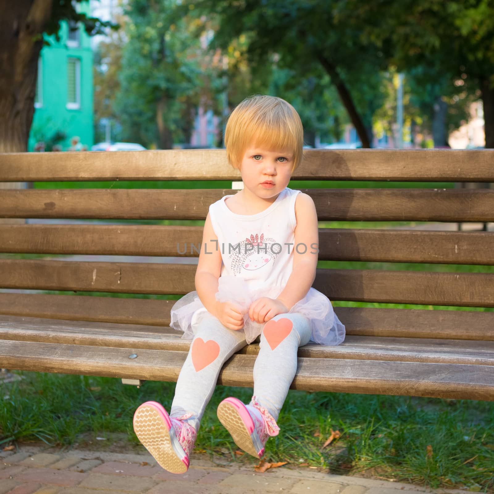 Outdoor portrait  of cute little girl by sarymsakov