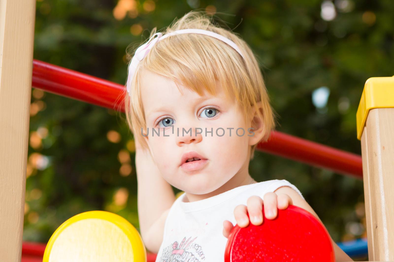 Outdoor portrait  of cute little girl by sarymsakov